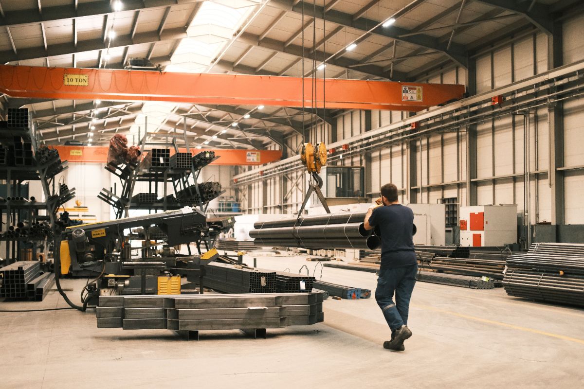 Fabrication yard with welded pipe spools and gantry crane